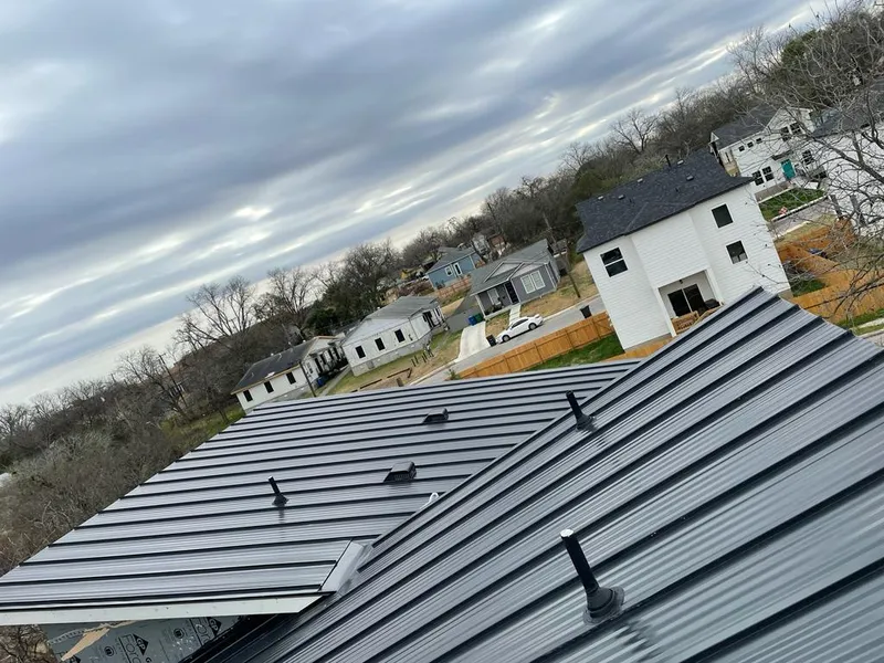 Standing seam metal roof panels with vents for Skylight Repair in St. Cloud